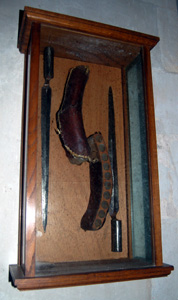 Bayonets and cartridges on the west wall of the nave January 2011